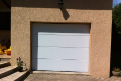 porte-de-garage-sectionnelle-blanche-dolomieu
